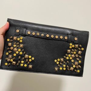 black clutch with Gold trim and crystals